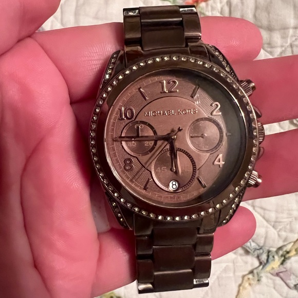 Brown/bronze Michael Kors watch. Just needs a new battery